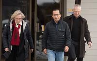 Wet'suwet'en hereditary leader Chief Woos, also known as Frank Alec, centre, Minister of Crown-Indigenous Relation, Carolyn Bennett, left, and B.C. Indigenous Relations Minister Scott Fraser arrive to address the media in Smithers, B.C., Sunday, March 1, 2020. THE CANADIAN PRESS/Jonathan Hayward