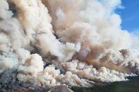 The Donnie Creek wildfire (G80280) burns in an area between Fort Nelson and Fort St. John, B.C. in this undated handout photo. The Peace River Regional District issued a new evacuation order as well as an alert Sunday in response to two wildfires burning in northeastern British Columbia. THE CANADIAN PRESS/HO, BC Wildfire Service *MANDATORY CREDIT*