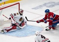 Montreal Canadiens Joel Armia (40) scores on Chicago Blackhawks goaltender Jaxson Stauber (30) during third period NHL hockey action Tuesday, February 14, 2023 in Montreal. THE CANADIAN PRESS/Ryan Remiorz