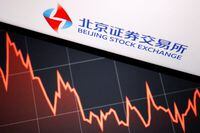 The logo of China's Beijing Stock Exchange is seen by a stock chart in this illustration picture taken November 12, 2021.