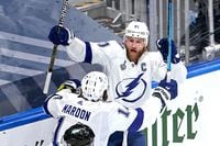 Tampa Bay Lightning captain Steven Stamkos, right, is congratulated by Pat Maroon after scoring a goal against the Dallas Stars during the first period in Game 3 of the 2020 NHL Stanley Cup Final at Rogers Place on Sept. 23, 2020. The Lightning won 5-2.