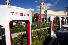 Tesla electric vehicles are seen at Tesla chargers Wednesday, May 10, 2023, in Westlake, Calif.