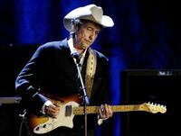 FILE PHOTO: Rock musician Bob Dylan performs at the Wiltern Theatre in Los Angeles in this May 5, 2004 file photo. REUTERS/Rob Galbraith/Files/File Photo