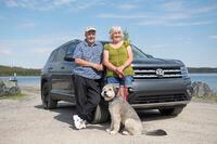 Sue and Norm Glowach with their rescue dog, Jack, and their Volkswagen Atlas at Prelude Lake campgrounds, located outside of Yellowknife, Northwest Territories. 