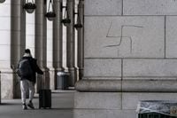 A hand-drawn swastika is seen on the front of Union Station near the Capitol in Washington, Friday, Jan. 28, 2022. (AP Photo/J. Scott Applewhite)