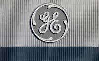 FILE PHOTO: The logo of U.S. conglomerate General Electric is pictured at the site of the company's energy branch in Belfort, France, February 5, 2019. REUTERS/Vincent Kessler/File Photo