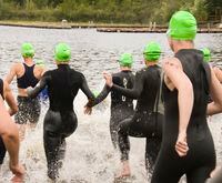 triathlon, women, race		Collection:iStockphoto		Item number:92244532		Title:Womans Triathlon Start		License type:Royalty-free		Max file size (JPEG):8.8 x 7.2 in (2,636 x 2,174 px) / 300 dpi 		Release info:No release requiredKeywords:Adult, Adults Only, Athlete, Cap, Color Image, Competition, Competitive Sport, Extreme Sports, Green, Group Of People, Horizontal, Human Leg, Lake, Medium Group Of People, Muscular Build, Only Women, Outdoors, Part Of, People, Photography, Rear View, Running, Splashing, Sport, Sports Race, Swimming, Swimming Cap, Track And Field Athlete, Track and Field Event, Triathlon, Water, Wetsuit, Women