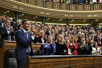 Spain's newly re-appointed Prime Minister Pedro Sanchez is congratulated at the Spanish parliament, Madrid, Spain, November 16, 2023.  Javier Soriano/Pool via REUTERS