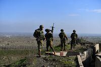 Israeli soldiers operate in the Israeli-occupied Golan Heights near the border with Syria, amid the ongoing conflict between Israel and the Palestinian Islamist group Hamas, December 28, 2023. REUTERS/Gil Eliyahu  ISRAEL OUT. NO COMMERCIAL OR EDITORIAL SALES IN ISRAEL