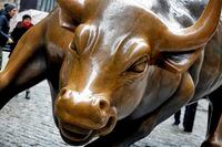 FILE - This Feb. 7, 2018 file photo shows The Charging Bull sculpture by Arturo Di Modica, in New York's Financial District. Many along Wall Street expect the bull market rally that began in March 2009 to eclipse the 1990-2000 run that ended with the dot-com crash. But more voices are questioning whether the stock market‚Äôs run will make it beyond 2019 or 2020. (AP Photo/Richard Drew, File)