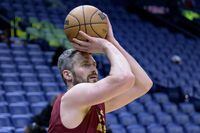 Cleveland Cavaliers forward Kevin Love warms up before an NBA basketball game against the New Orleans Pelicans in New Orleans, Friday, Feb. 10, 2023. (AP Photo/Matthew Hinton)