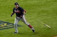 Atlanta Braves' Austin Riley celebrates a run home against the Los Angeles Dodgers during the ninth inning in Game 1 of a baseball National League Championship Series Monday, Oct. 12, 2020, in Arlington, Texas.