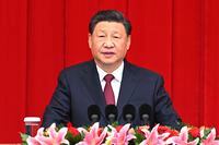 In this photo released by Xinhua News Agency, Chinese President Xi Jinping delivers a speech at the New Year gathering organized by the National Committee of the Chinese People's Political Consultative Conference (CPPCC) in Beijing, Friday, Dec. 31, 2021. (Li Xiang/Xinhua via AP)