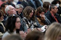 Families and friends listen to a tribute to victims before the Mass Casualty Commission delivers its final report into the April 2020 mass shootings, when a gunman who at one point masqueraded as a police officer caused country's worst mass shooting during a 12-hour rampage, in Truro, Nova Scotia, Canada March 30, 2023. Darren Calabrese/Pool via REUTERS REFILE - CORRECTING MONTH