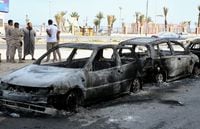 Vehicles destroyed after fighting between soldiers loyal to the head of Libya's Government of National Unity, Abdulhamid al-Dbeibah, and rival forces, are seen in Tripoli, Libya, May 17, 2022. REUTERS/Hazem Ahmed