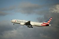 FILE PHOTO: An American Airlines Boeing 777 plane takes off from Paris Charles de Gaulle airport in Roissy-en-France near Paris, France, December 2, 2021. REUTERS/Sarah Meyssonnier/File Photo  GLOBAL BUSINESS WEEK AHEAD/File Photo
