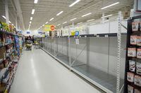 Empty shelves are pictured at a grocery store in North Vancouver, B.C. Monday, March 16, 2020. THE CANADIAN PRESS/Jonathan Hayward