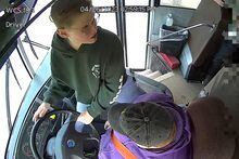In this image made from video, seventh-grader Dillon Reeves grabs the steering wheel on his school bus and hit the brakes after the driver passed out Wednesday, April 28, 2023, Warren, Mi. Warren Consolidated Schools Superintendent Robert Livernois is calling it an “extraordinary act of courage.” (Warren Consolidated Schools via AP)