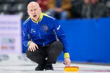 Alberta skip Kevin Koe watches his shot during his match against Reid Carruthers' Wild Card team from the Morris Curling Club in Manitoba at the 2023 Tim Hortons Brier at Budweiser Gardens in London, Ont. on Monday, March 6, 2023. THE CANADIAN PRESS/ Geoff Robins