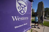 Students walk across campus at Western University in London, Ont., Saturday, Sept. 19, 2020. THE CANADIAN PRESS/Geoff Robins