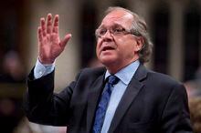 Aboriginal Affairs Minister Bernard Valcourt responds to a question during question period in the House of Commons, Tuesday, June 17, 2014, in Ottawa.Former federal Conservative cabinet minister Valcourt has pleaded not guilty to obstructing and resisting police. THE CANADIAN PRESS/Adrian Wyld