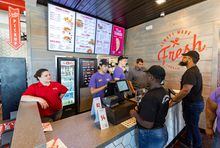 A new Slim Chickens will open its doors to customers on Monday along Tyndall Parkway in Callaway. Employees went through training at the restaurant on Friday, August 5, 2022.001 080522 Slim Chickens Callaway