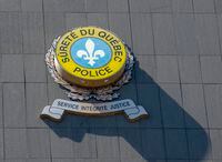 Quebec Provincial Police headquarters is seen Wednesday, April 17, 2019 in Montreal.&nbsp;Quebec provincial police say two more people from Ontario have been arrested in the brazen killing of a Quebec man inside a busy restaurant in June.&nbsp;THE CANADIAN PRESS/Ryan Remiorz