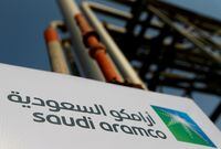 FILE PHOTO: Saudi Aramco logo is pictured at the oil facility in Abqaiq, Saudi Arabia October 12, 2019. REUTERS/Maxim Shemetov/File Photo