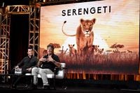BEVERLY HILLS, CALIFORNIA - JULY 25: (L-R) Creator & producer Simon Fuller and director & producer John Downer of 'Serengeti' speak onstage during the Discovery Channel portion of the Discovery Communications Summer 2019 TCA Tour at The Beverly Hilton Hotel on July 25, 2019 in Beverly Hills, California. (Photo by Amanda Edwards/Getty Images for Discovery)