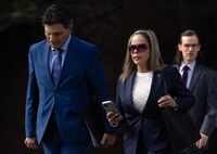 Tamara Lich walks with her lawyer Lawrence Greenspon as they make their way to the courthouse for trial, Wednesday, Sept. 13, 2023 in Ottawa.  THE CANADIAN PRESS/Adrian Wyld