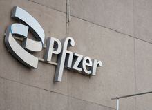FILE PHOTO: A  compagny logo is seen at a Pfizer office in Puurs, Belgium, December 2, 2022. REUTERS/Johanna Geron