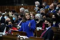 Finance Minister Chrystia Freeland tables the federal budget in the House of Commons as Prime Minister Justin Trudeau looks on in Ottawa, Thursday, April 7, 2022. The Liberal budget laid out money for a new dental care program Thursday, but not necessarily a plan. THE CANADIAN PRESS/Adrian Wyld
