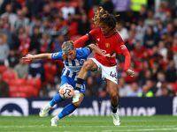 Soccer Football - Premier League - Manchester United v Brighton & Hove Albion - Old Trafford, Manchester, Britain - September 16, 2023 Brighton & Hove Albion's Billy Gilmour in action with Manchester United's Hannibal Mejbri REUTERS/Molly Darlington