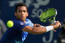 Canada's Felix Auger-Aliassime returns the ball to Maxime Cressy of the U.S. during a match of the Dubai Duty Free Tennis Championships in Dubai, United Arab Emirates, Tuesday, Feb 28, 2023. Auger-Aliassime was eliminated in the second round of the Dubai Tennis Championships with a 7-6 (4), 6-4 loss to Italy's Lorenzo Sonego on Wednesday. THE CANADIAN PRESS/AP-Kamran Jebreili