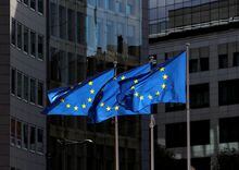 FILE PHOTO: European Union flags flutter outside the European Commission headquarters in Brussels, Belgium August 21, 2020. REUTERS/Yves Herman/File Photo