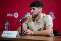 Toronto FC midfielder Jonathan Osorio speaks during a press conference in Toronto on Tuesday, December 13, 2022. Osorio, whose contract with Toronto FC had expired, has signed a new three-year contract plus a 2026 option with Toronto, using targeted allocation money. THE CANADIAN PRESS/Eduardo Lima