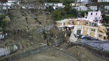 An aerial view of damaged houses after heavy rainfall triggered landslides that collapsed buildings and left as many as 12 people missing, in Casamicciola, on the southern Italian island of Ischia, Sunday, Nov. 27, 2022. Authorities said that the landslide that early Saturday destroyed buildings and swept parked cars into the sea left one person dead and 12 missing. (AP Photo/Salvatore Laporta)