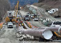 The last section of pipeline is assembled on the Trans Mountain pipeline expansion project before operations are expected to begin in the second quarter of 2024, near Laidlaw, British Columbia, Canada, February 18, 2024.  REUTERS/Chris Helgren 