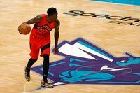 CHARLOTTE, NORTH CAROLINA - DECEMBER 12: Pascal Siakam #43 of the Toronto Raptors dribbles the ball during the first half of their game against the Charlotte Hornets at Spectrum Center on December 12, 2020 in Charlotte, North Carolina. (Photo by Jared C. Tilton/Getty Images)