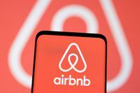 FILE PHOTO: Airbnb logo is seen displayed in this illustration taken, May 3, 2022. REUTERS/Dado Ruvic/Illustration
