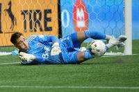 Aug 17, 2022; Vancouver, British Columbia, CAN;  Vancouver Whitecaps FC goalkeeper Thomas Hasal (1) makes a save against the Colorado Rapids during the second half at BC Place. Mandatory Credit: Anne-Marie Sorvin-USA TODAY Sports