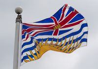 British Columbia's provincial flag flies in Ottawa, Friday July 3, 2020. Thousands of residents on British Columbia's south coast and southern Interior spent the night without power after a fierce windstorm blew through the region Sunday. THE CANADIAN PRESS/Adrian Wyld