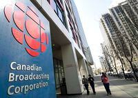 Canada’s leading media companies are banding together to work on reducing their collective impact on the environment. People walk into a CBC building in Toronto on April 4, 2012.THE CANADIAN PRESS/Nathan Denette