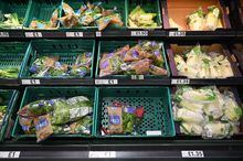 Vegetables, including lettuce and salad leaves, wrapped in plastic packaging, are pictured in a Tesco supermarket, west of London on January 14, 2023. - England will ban a wide range of single-use plastic items from October including plates and cutlery in order to limit their "devastating" effect on the environment, the government said Saturday. (Photo by JUSTIN TALLIS / AFP) (Photo by JUSTIN TALLIS/AFP via Getty Images)
