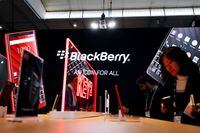 Visitors attend the Blackberry booth at the Mobile World Congress in Barcelona, Spain on Feb. 25, 2019.