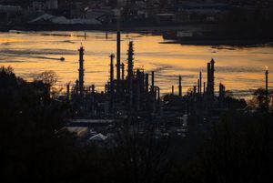 Parkland Fuel Corp. said Thursday its Burnaby, B.C. refinery is not for sale, even in the face of pressure from an activist investor. A boat travels past the Parkland Burnaby Refinery on Burrard Inlet at sunset in Burnaby, B.C., on Saturday, April 17, 2021. THE CANADIAN PRESS/Darryl Dyck