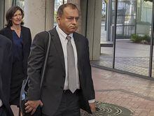 FILE - Ramesh "Sunny" Balwani, right, the former lover and business partner of Theranos CEO Elizabeth Holmes, walks into federal court in San Jose, Calif., on June 24, 2022. Balwani learns Wednesday, Dec. 7, 2022, whether he will be punished as severely as Holmes for peddling the company's bogus blood-testing technology that duped investors and endangered patients. (AP Photo/Michael Liedtke, File)