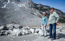 Monica Field and David McIntyre are opposed to the twinning of the highway through the Frank Slide in the Crowsnest Pass and are pictured at the base of the slide near Blairmore, Alta., Wednesday, May 3, 2023. On April 29, 1903 a massive landslide buried the town of Frank killing 70 people. THE CANADIAN PRESS/Jeff McIntosh