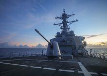 FILE PHOTO: Arleigh Burke-class guided-missile destroyer USS Benfold (DDG 65), forward-deployed to the U.S. 7th Fleet area of operations, conducts underway operations in the South China Sea, in this handout picture released on July 13, 2022. U.S. Navy/Handout via REUTERS