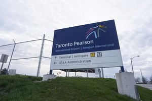 Toronto Pearson International Airport says it has temporarily grounded some flights due to dense fog in the area causing low visibility for pilots. A sign for Toronto Pearson International Airport is pictured in Mississauga, Ont., on Thursday, April 20, 2023. THE CANADIAN PRESS/Arlyn McAdorey